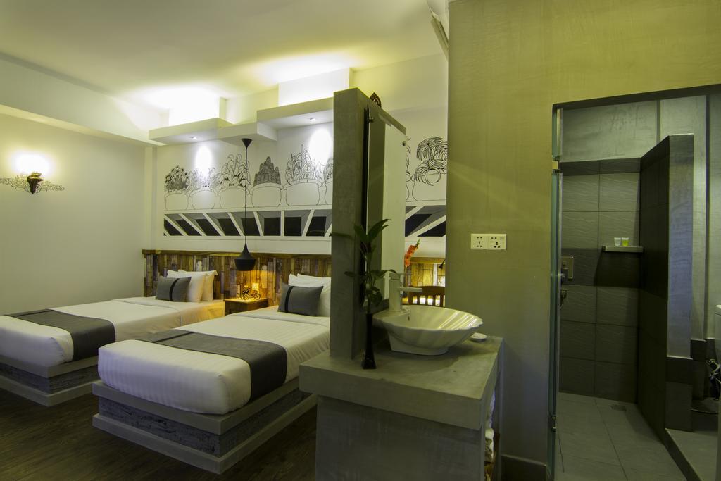 Double Leaf Boutique Hotel Phnom Penh Zimmer foto